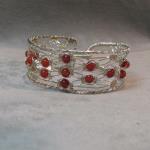 12 strand Silver Lace and Carnelian bracelet.  1" wide made of natural stone and sterling,  hand knotted.  specify size.   $85.00