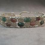 6 sstrand Silver Lace and Poppy Jasper bracelet.  Hand knotted sterling siler, easy clasp, specify size, 1/2" wide  $75.00