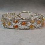 8 strand Silver Lace and carnelian bracelet.  hand knotted of sterling silver, natural stones, easy clasp, specify size.  $80.00